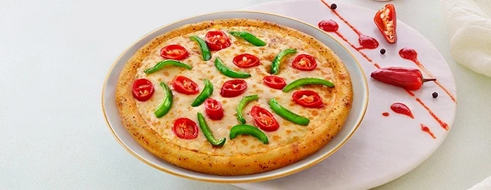 Capsicum & Red Paprika with Videshi Hot Sauce — official Domino's India menu photo