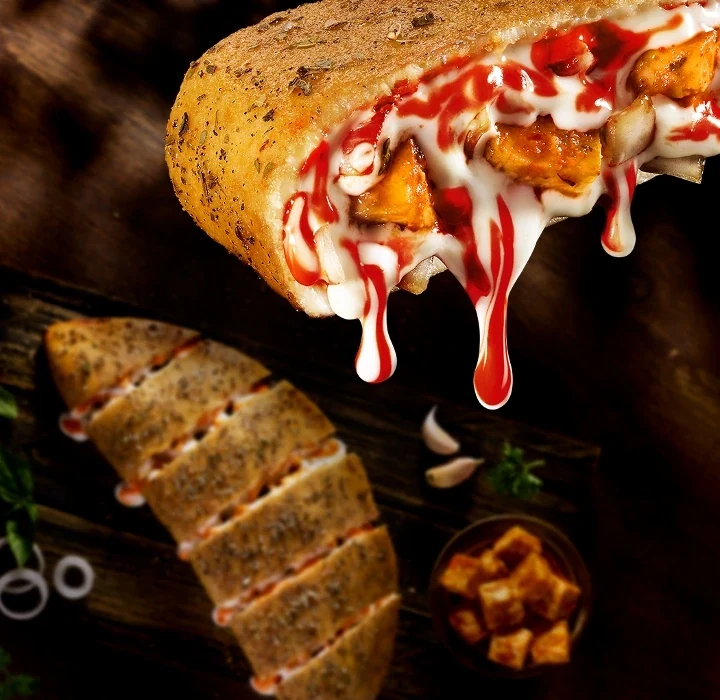 Fiery Paneer Tikka Garlic Bread — official Domino's India menu photo