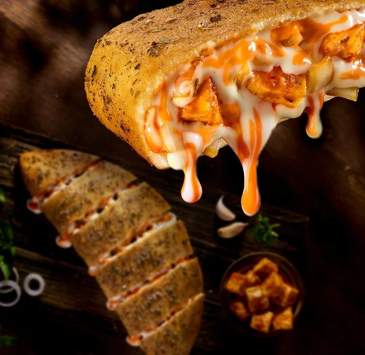 Makhani Paneer Tikka Garlic Bread — official Domino's India menu photo