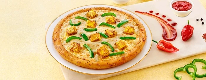 Paneer & Capsicum with Videshi Hot Sauce — official Domino's India menu photo