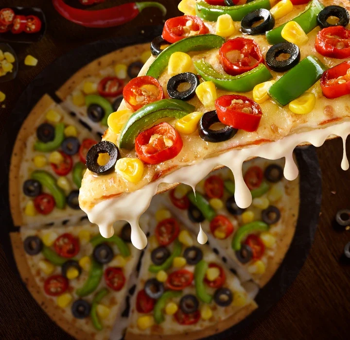 Reg. CB Veg Paradise LXT OAG — official Domino's India menu photo