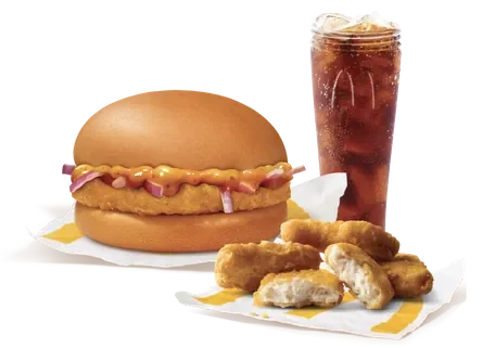 Chicken Surprise Burger + 4 Pc Chicken McNuggets + Coke — official McDelivery India menu photo