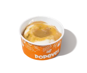 Mashed Potatoes with Cajun Gravy — official Popeyes menu photo