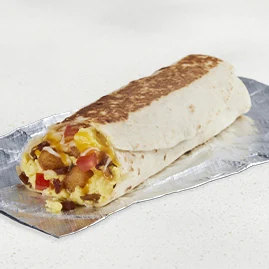 Grande Toasted Breakfast Burrito Bacon — official Taco Bell menu photo